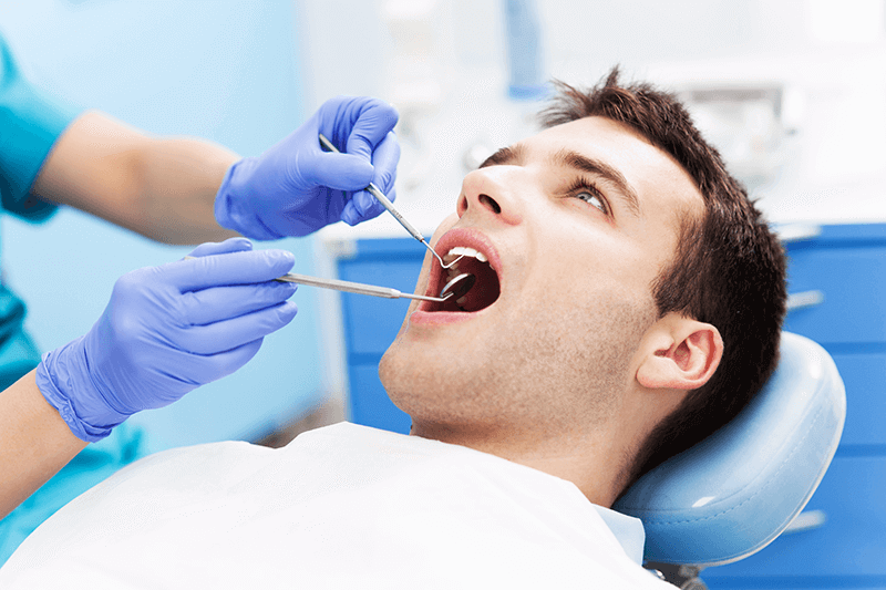 man in dental chair