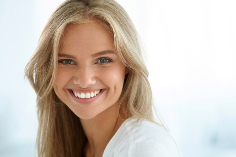 young woman with a dazzling straight smile