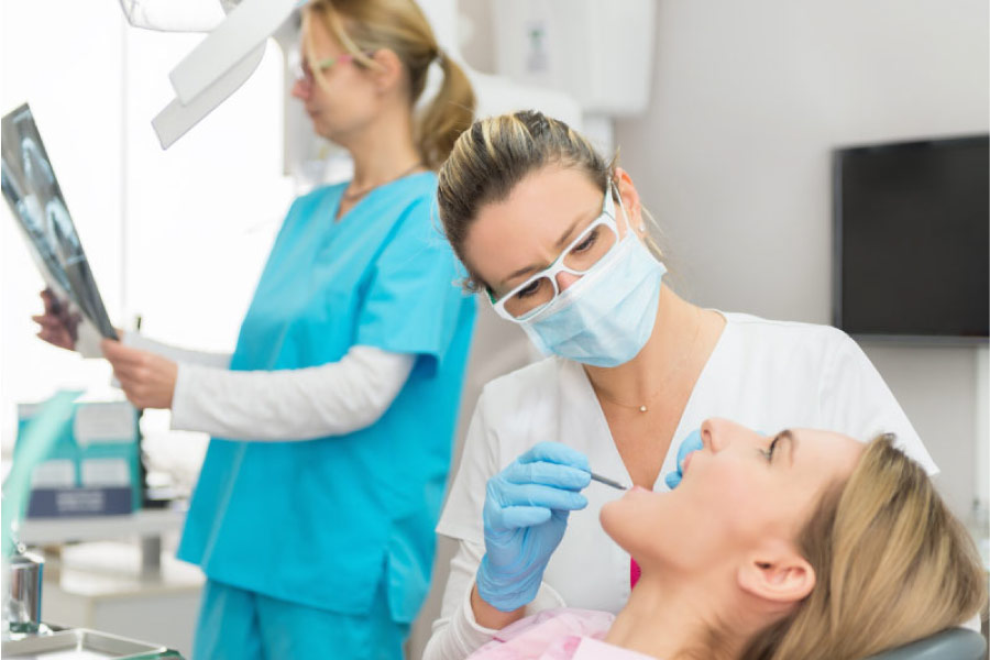 woman getting a dental checkup